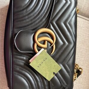 Gucci Quilted Black Shoulder Bag with Gold Hardware